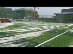 fill the sand to the soccer artificial grass.MP4
